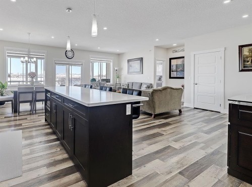 125 Westview Drive, Nanton, AB - Indoor Photo Showing Kitchen With Upgraded Kitchen