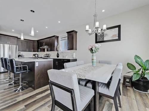 125 Westview Drive, Nanton, AB - Indoor Photo Showing Dining Room