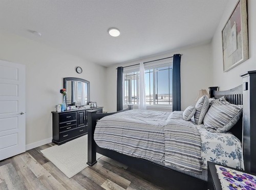 125 Westview Drive, Nanton, AB - Indoor Photo Showing Bedroom