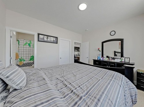 125 Westview Drive, Nanton, AB - Indoor Photo Showing Bedroom