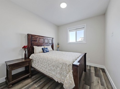 125 Westview Drive, Nanton, AB - Indoor Photo Showing Bedroom
