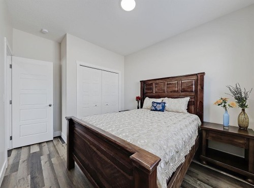 125 Westview Drive, Nanton, AB - Indoor Photo Showing Bedroom