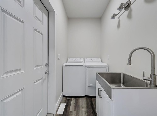 125 Westview Drive, Nanton, AB - Indoor Photo Showing Laundry Room