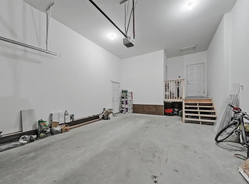 125 Westview Drive, Nanton, AB - Indoor Photo Showing Garage
