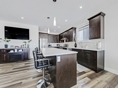 125 Westview Drive, Nanton, AB - Indoor Photo Showing Kitchen