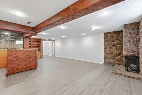 5031 Vienna Drive Nw, Calgary, AB - Indoor With Fireplace