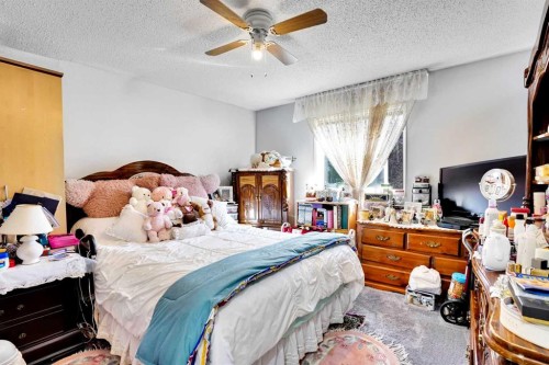 203-21 Dover Point Se, Calgary, AB - Indoor Photo Showing Bedroom