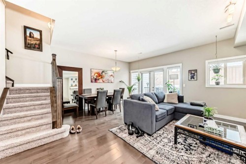 106 Cougar Ridge Landing Sw, Calgary, AB - Indoor Photo Showing Living Room