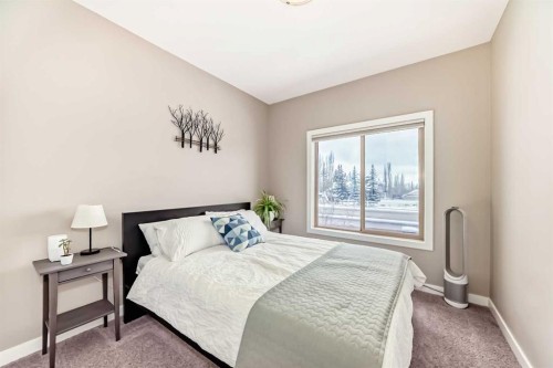 106 Cougar Ridge Landing Sw, Calgary, AB - Indoor Photo Showing Bedroom
