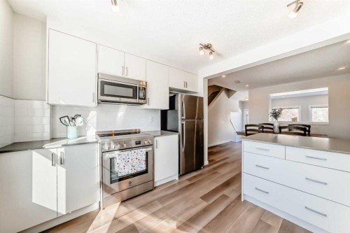 272 Cranbrook Square Se, Calgary, AB - Indoor Photo Showing Kitchen With Stainless Steel Kitchen With Upgraded Kitchen