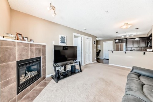 4216-31 Country Village Manor Ne, Calgary, AB - Indoor Photo Showing Living Room With Fireplace