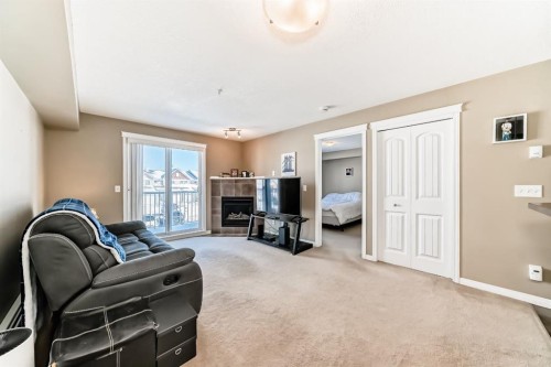4216-31 Country Village Manor Ne, Calgary, AB - Indoor Photo Showing Living Room With Fireplace