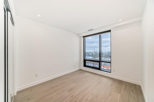 415-8375 Broadcast Avenue Sw, Calgary, AB - Indoor Photo Showing Other Room