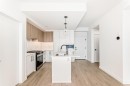 415-8375 Broadcast Avenue Sw, Calgary, AB  - Indoor Photo Showing Kitchen With Upgraded Kitchen 