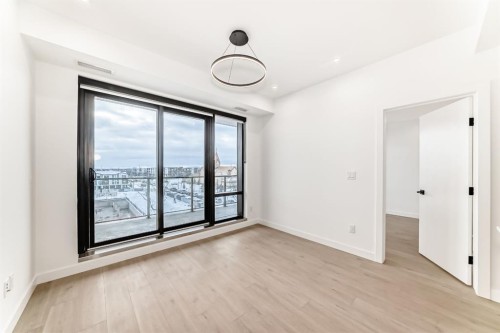 415-8375 Broadcast Avenue Sw, Calgary, AB - Indoor Photo Showing Other Room