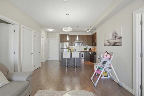 206-12 Sage Hill Terrace Nw, Calgary, AB - Indoor Photo Showing Living Room