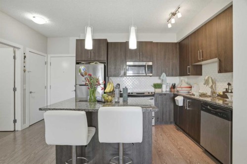 206-12 Sage Hill Terrace Nw, Calgary, AB - Indoor Photo Showing Kitchen With Stainless Steel Kitchen With Upgraded Kitchen