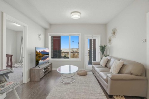 206-12 Sage Hill Terrace Nw, Calgary, AB - Indoor Photo Showing Living Room