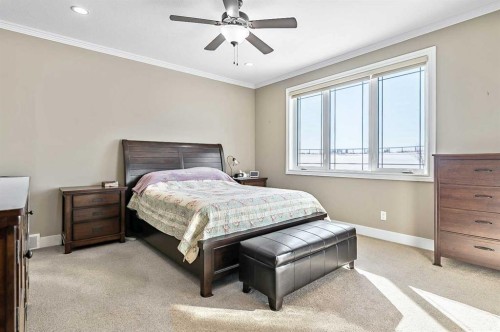 108 Ravencrest Drive, Rural Foothills County, AB - Indoor Photo Showing Bedroom