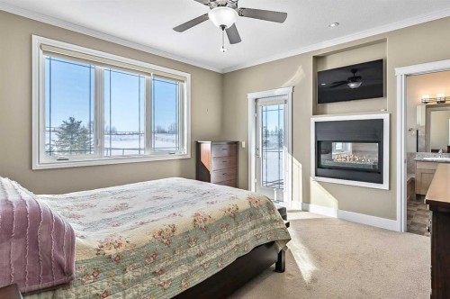 108 Ravencrest Drive, Rural Foothills County, AB - Indoor Photo Showing Bedroom