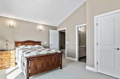 108 Ravencrest Drive, Rural Foothills County, AB - Indoor Photo Showing Bedroom