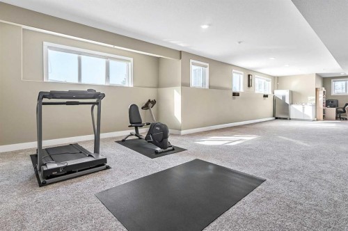 108 Ravencrest Drive, Rural Foothills County, AB - Indoor Photo Showing Gym Room
