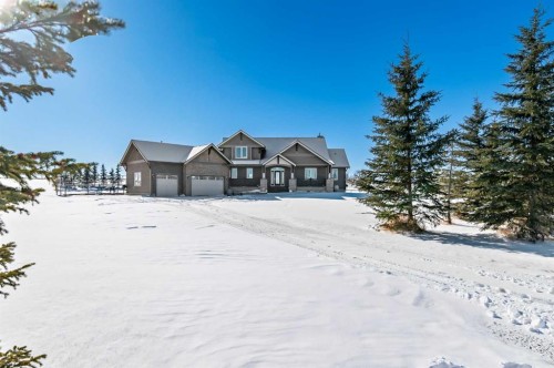 108 Ravencrest Drive, Rural Foothills County, AB - Outdoor With Facade