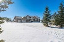 108 Ravencrest Drive, Rural Foothills County, AB  - Outdoor With Facade 
