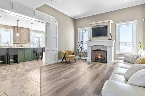 108 Ravencrest Drive, Rural Foothills County, AB - Indoor Photo Showing Living Room With Fireplace
