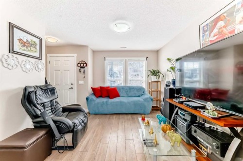 38 Auburn Bay Link Se, Calgary, AB - Indoor Photo Showing Living Room
