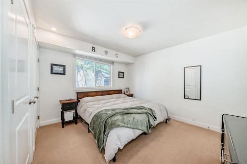 208 Woodbine Boulevard Sw, Calgary, AB - Indoor Photo Showing Bedroom