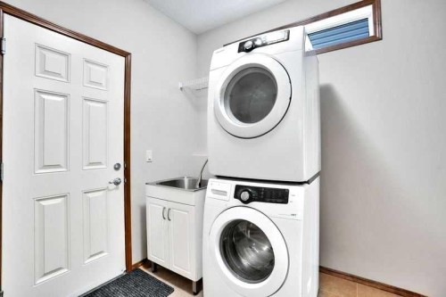117 Walden Square Se, Calgary, AB - Indoor Photo Showing Laundry Room