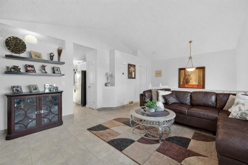 131 Covepark Place Ne, Calgary, AB - Indoor Photo Showing Living Room