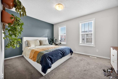 369 Walden Parade Se, Calgary, AB - Indoor Photo Showing Bedroom
