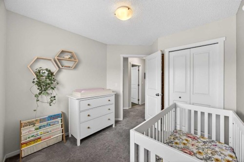 369 Walden Parade Se, Calgary, AB - Indoor Photo Showing Bedroom
