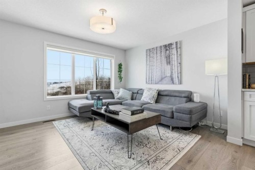 2202-250 Fireside View, Cochrane, AB - Indoor Photo Showing Living Room