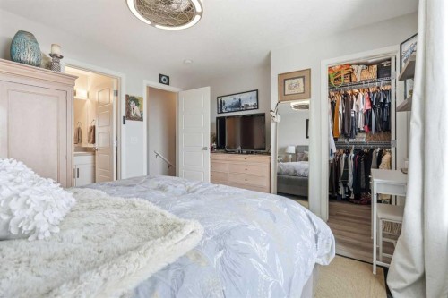 2202-250 Fireside View, Cochrane, AB - Indoor Photo Showing Bedroom