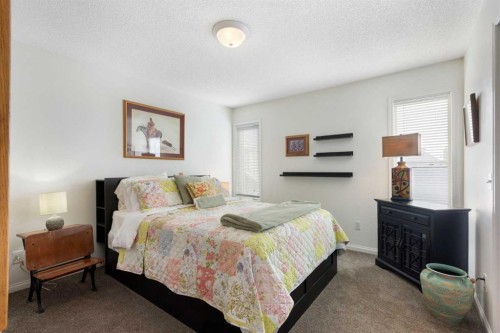 25 Promenade Way Se, Calgary, AB - Indoor Photo Showing Bedroom