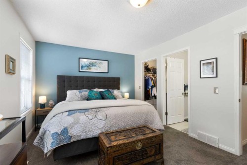 25 Promenade Way Se, Calgary, AB - Indoor Photo Showing Bedroom