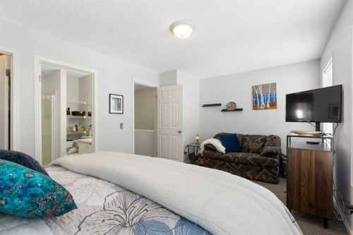 25 Promenade Way Se, Calgary, AB - Indoor Photo Showing Bedroom