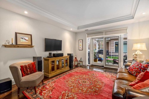 105-121 Quarry Way Se, Calgary, AB - Indoor Photo Showing Living Room