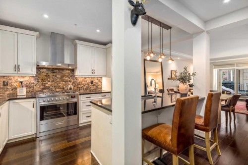 105-121 Quarry Way Se, Calgary, AB - Indoor Photo Showing Kitchen With Upgraded Kitchen