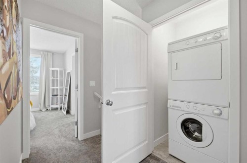 53 Sagehill Common Nw, Calgary, AB - Indoor Photo Showing Laundry Room