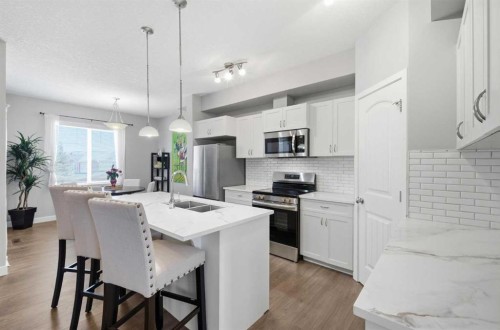 53 Sagehill Common Nw, Calgary, AB - Indoor Photo Showing Kitchen With Stainless Steel Kitchen With Double Sink With Upgraded Kitchen