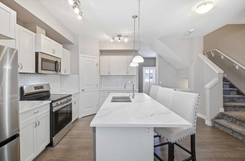 53 Sagehill Common Nw, Calgary, AB - Indoor Photo Showing Kitchen With Stainless Steel Kitchen With Double Sink With Upgraded Kitchen