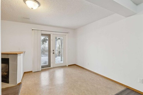 228 Macewan Park View Nw, Calgary, AB - Indoor Photo Showing Other Room