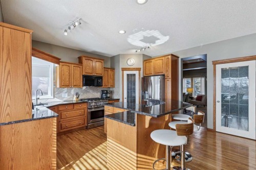 63 Evergreen Heights Sw, Calgary, AB - Indoor Photo Showing Kitchen With Stainless Steel Kitchen