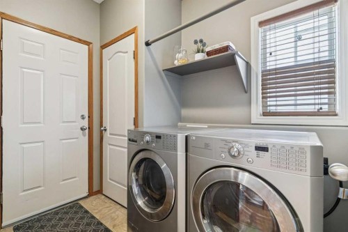 63 Evergreen Heights Sw, Calgary, AB - Indoor Photo Showing Laundry Room
