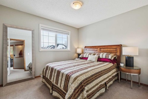 63 Evergreen Heights Sw, Calgary, AB - Indoor Photo Showing Bedroom