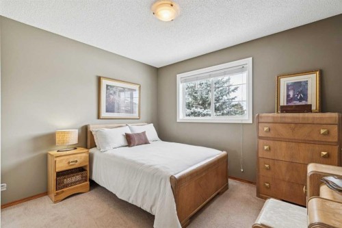 63 Evergreen Heights Sw, Calgary, AB - Indoor Photo Showing Bedroom